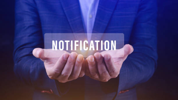 istock Businessman holding button notification on virtual screens, business, technology, internet and networking concept. 1646087527