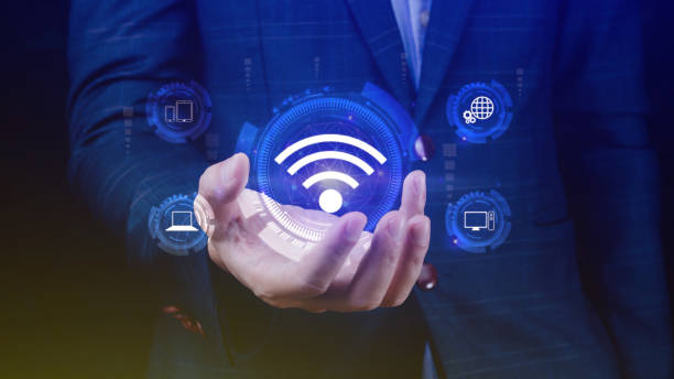 istock Businessman using holding with wifi icon. Social network business communication concept, Wifi wireless concept free network Internet concept. 1646087550