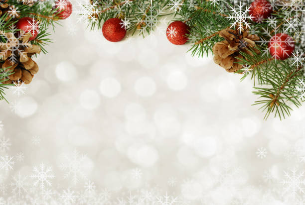 istock Christmas decorations on white bokeh background with snowflakes 1646097445