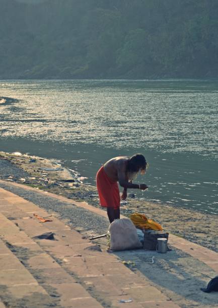 istock a monk at the bank pf ganga river 1646105622