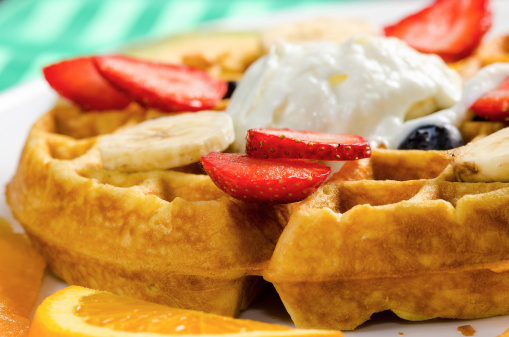 Delicious combination of waffle, ice cream and varied fruits