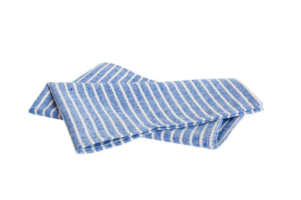 istock Blue textile napkin isolated on white background. Folded decorative kitchen cotton towel. Top view 1646119120