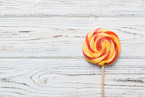 Set of colorful lollipops on colored background. Summer concept. Party Happy Birthday or Minimalist Concept.
