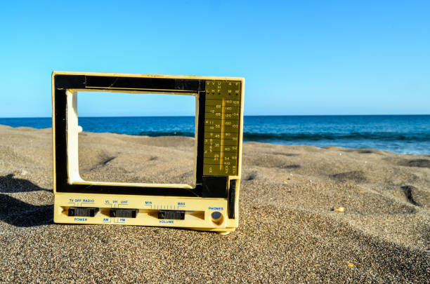istock Television on the Sand Beach 1646143593