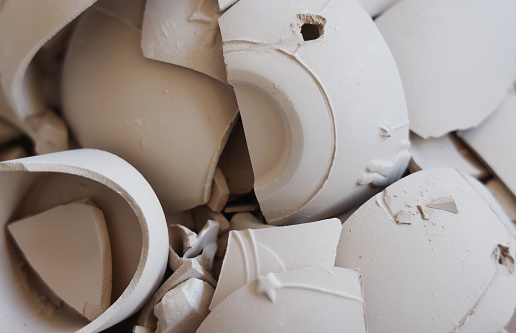 Close up view of broken porcelain fragments