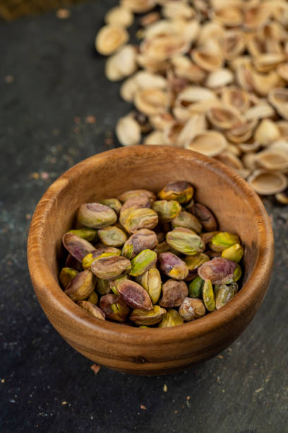 istock peeled fresh crunchy pistachios, green nuts pistachios 1646185069