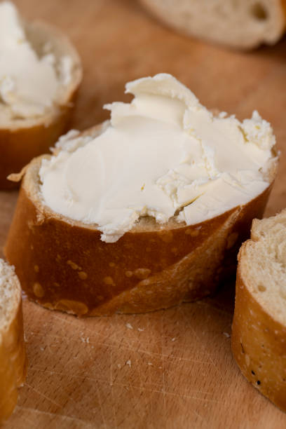 istock fresh soft cheese made from cow's milk spread on wheat bread 1646187292