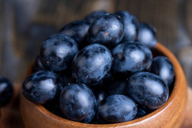 istock Unwashed blue grapes in the dust 1646188960