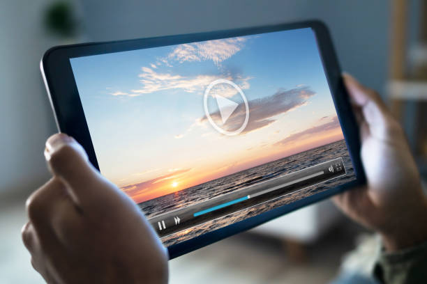 istock Man Watching Movie On Digital Tablet 1646206082