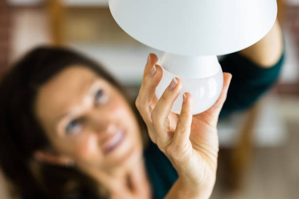 Electric LED Lightbulb Change In Light stock photo