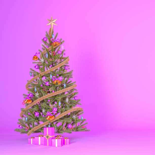 istock Christmas tree decorated with presents on pink background with copy space 1646210367