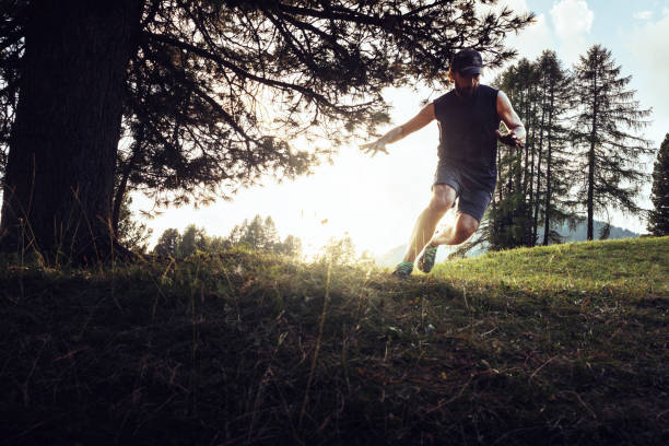 istock Man trail running in a mountain forest 1646235799