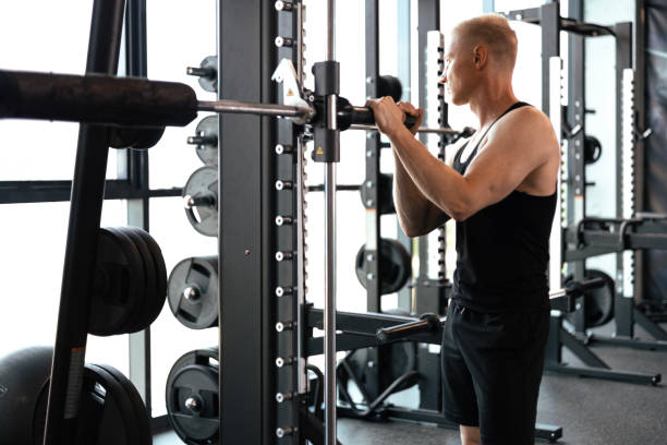 istock Sporty man resting, having break drinking water after doing exercise. 1646244079