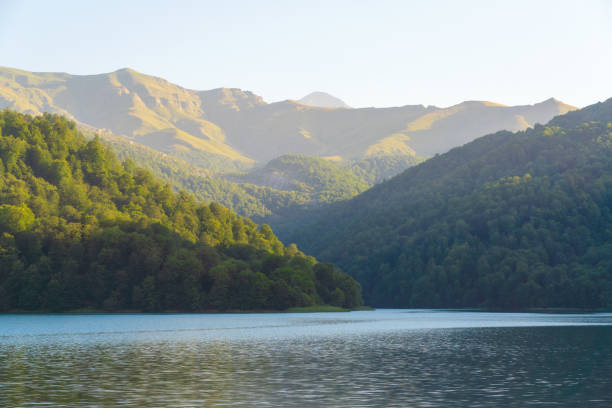 mountain lake goygol is located in the western region of azerbaijan near the ganja city - woods reflection famous place standing water imagens e fotografias de stock