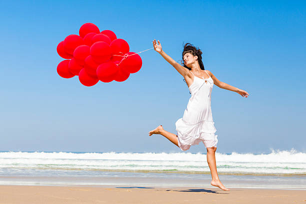 istock Running and Jumping with ballons 164627147