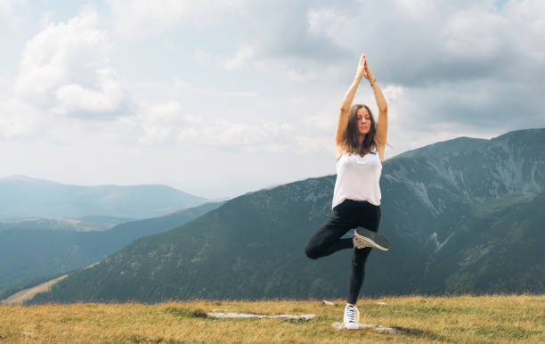 istock A beautiful woman practices Yoga exercises. 1646277755