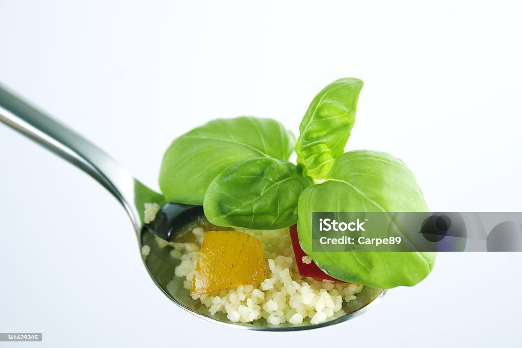 couscous Couscous dish with mixed vegetables Spoon Stock Photo