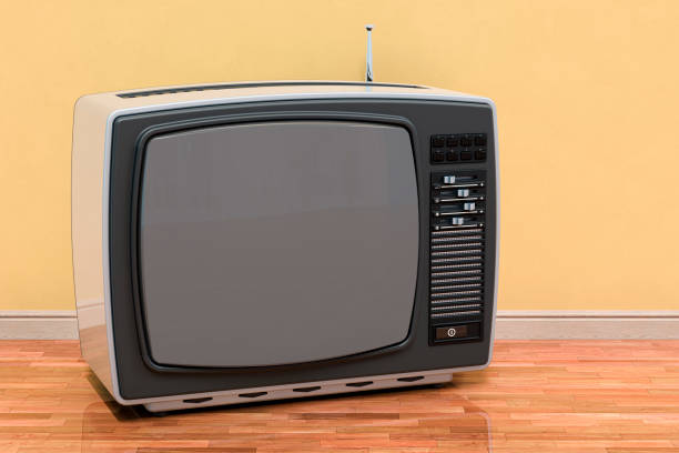 istock Retro TV set in room near wall, 3D rendering 1646299839