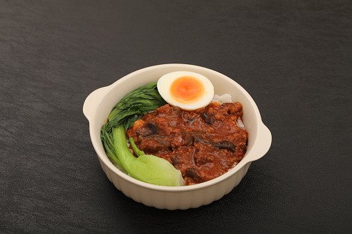 Minced pork rice with hot sauce.\nHot and spicy lu lo han is a classic Taiwanese dish of minced pork belly braised in hot and spicy sauce and served on a bed of rice.