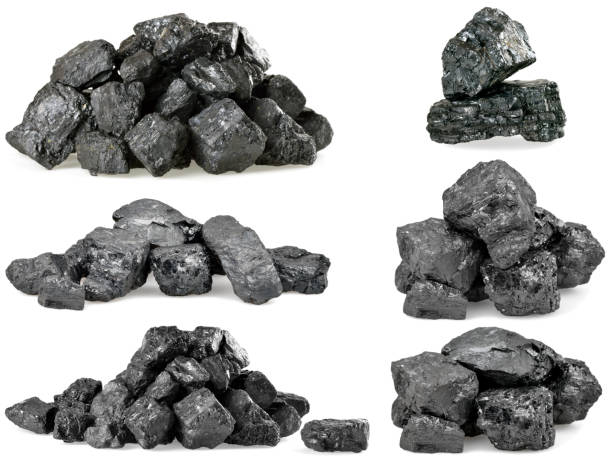 istock piles of coal isolated on white. Set. 164630642