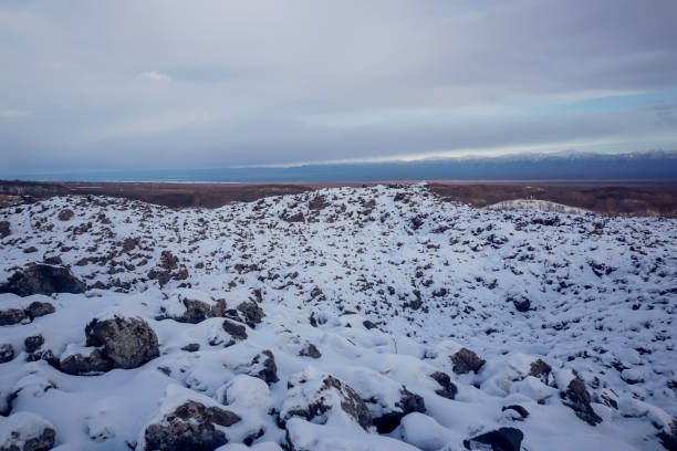 istock Frozen lava stones in winter 1646322143