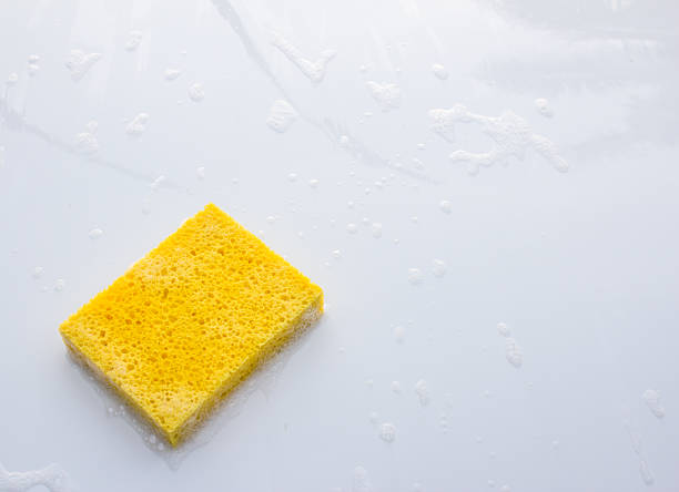istock yellow household sponge on a white background 164632819