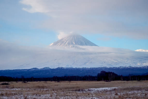 Erupting volcano Klyuchevskaya Sopka in Kamchatka in winter