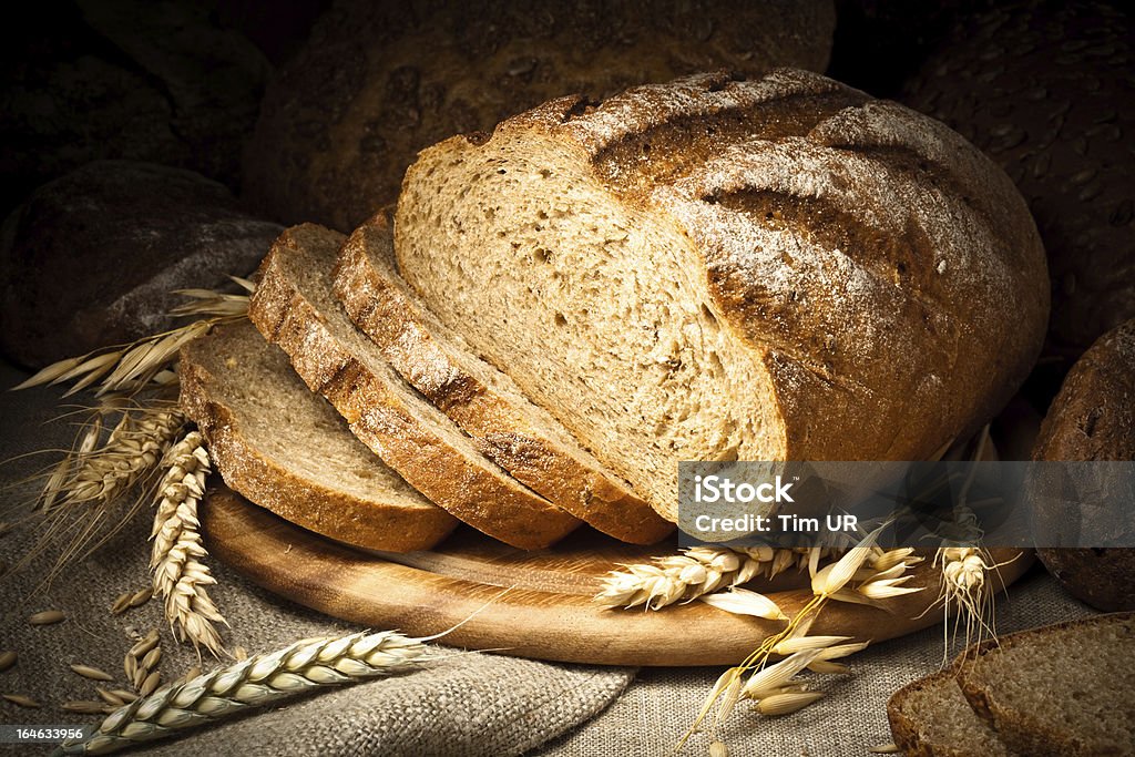 baked bread on wooden table Bagel Stock Photo