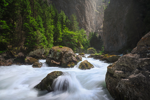 The stream in the Orrido of Pré Saint Didier, a view in summer of this deep ravine in Aosta valley. Italy.