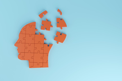 Unassembled head-shaped puzzle. Alzheimer , dementia and mental health concept. 3d illustration.