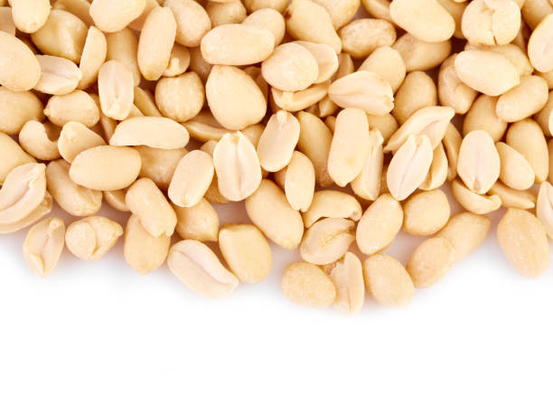 istock Peeled peanuts on a white background. Healthy food. Nuts. 1646364022