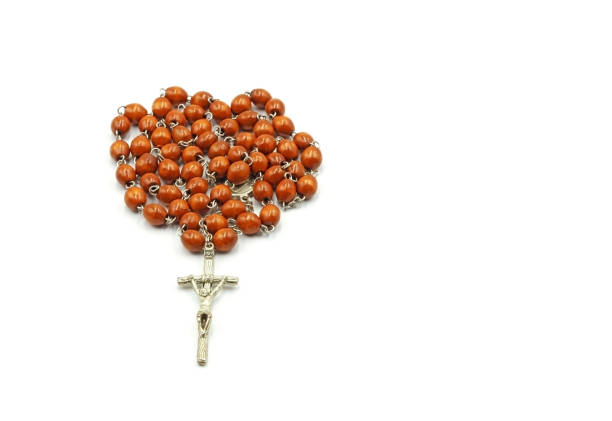 A Christian rosary on a white background