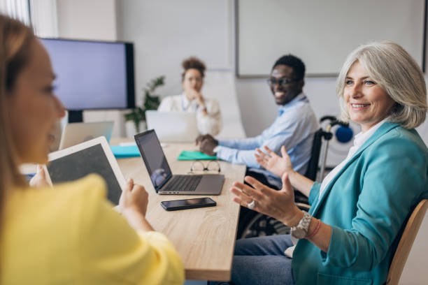 istock People in the modern office having a meeting and presentation 1646367871