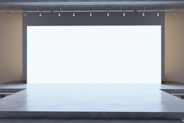 istock Contemporary luxury auditorium with stage and blank white mock up screen. 3D Rendering. 1646368170