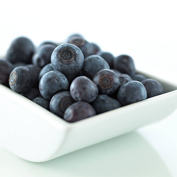 Blueberries in a bowl stock photo