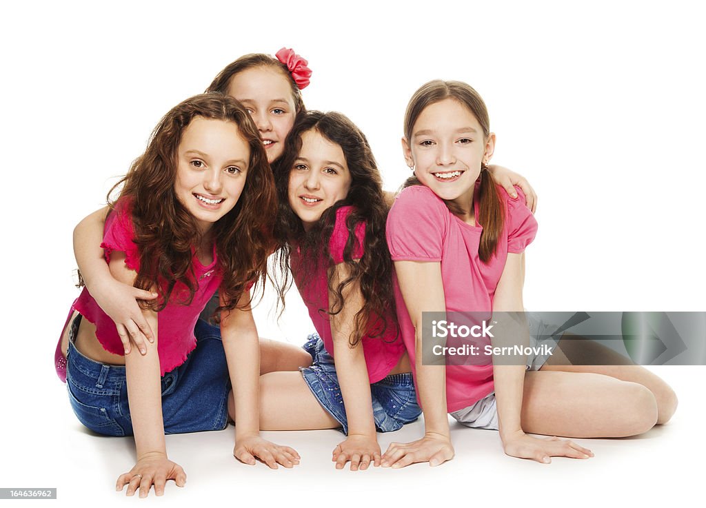Cuatro niños niñas en rosa - Foto de stock de Acostado libre de derechos