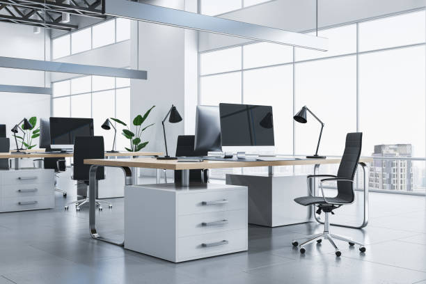 istock Clean bright coworking office interior with panoramic windows, city view, decorative plants and concrete flooring. 3D Rendering. 1646370783