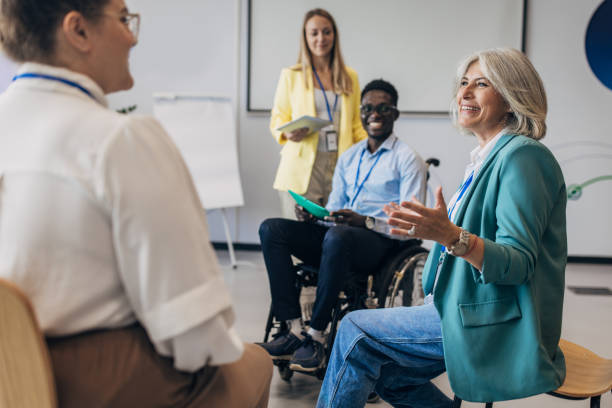 istock People in the modern office having a meeting and presentation 1646373112