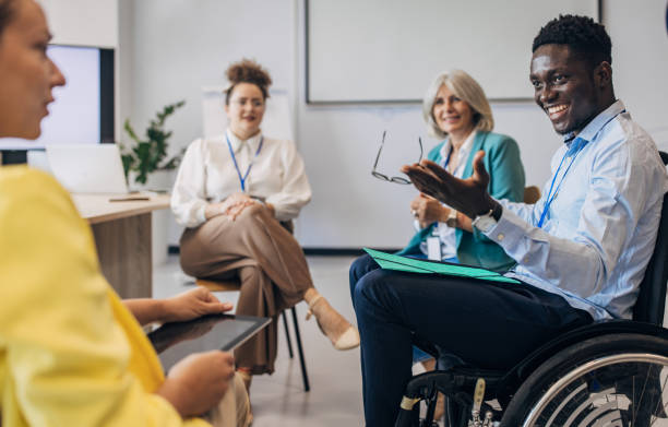 istock People in the modern office having a meeting and presentation 1646373668
