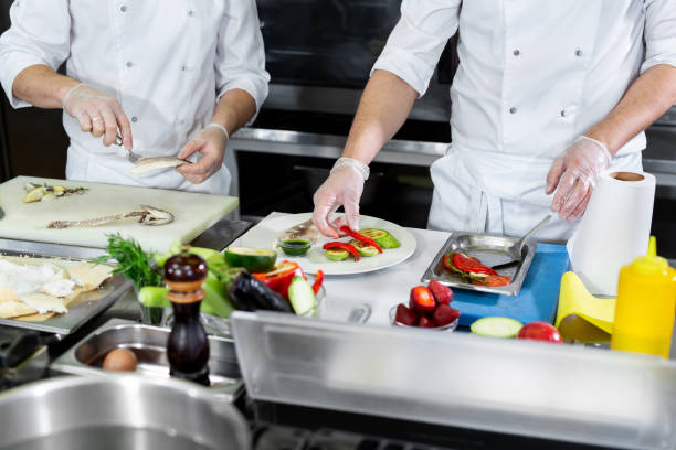 istock Chefs prepare meals in the kitchen. 1646374255