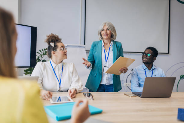 istock People in the modern office having a meeting and presentation 1646375986