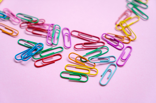Bunch of metal paper clips. 3D Illustration.