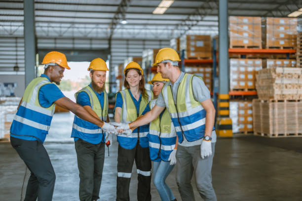 istock Diverse warehouse team create empowerment, confidence. Collaboration drives excellence in logistics 1646390601