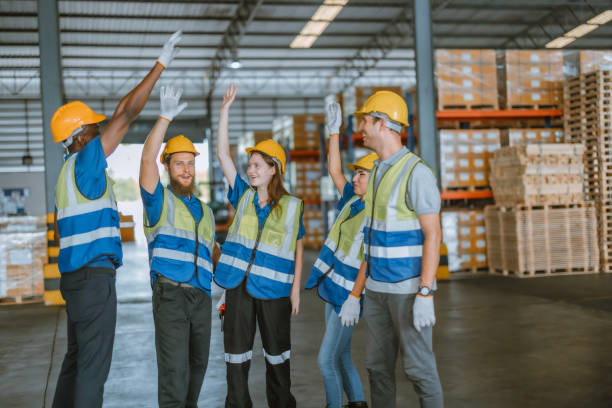 istock Diverse warehouse team create empowerment, confidence. Collaboration drives excellence in logistics 1646393683