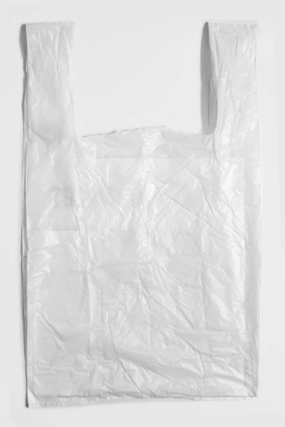 istock white plastic bag on white background. A White Plastic Bag Texture, macro, background. Reduction of plastic bags for natural treatment. The symbol of the campaign to refrain from using plastic bags. 1646394281