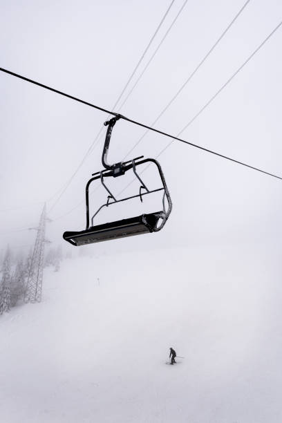istock Ski Lift in the Winter scene 1646398451