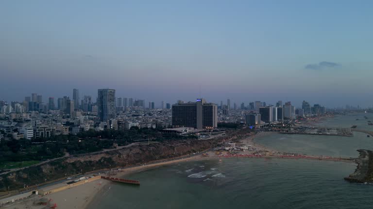 Aerial 50p footage of the waterfront of Tel Aviv - Yafo  at afternoon and dusk in summer