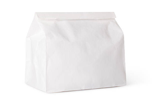 istock A singular paper lunch bag on white 164641007