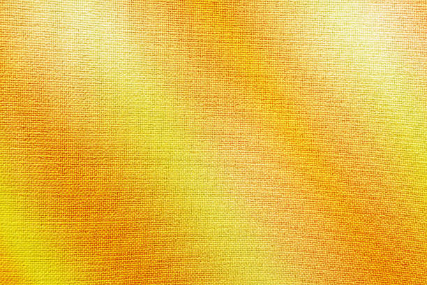 istock Light brown orange gold yellow silk satin. Color gradient. Golden luxury elegant abstract background. Shiny, shimmer. Curtain. Drapery. Fabric, cloth texture. Christmas, autumn. 1646416833