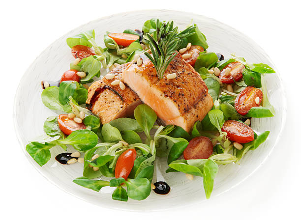istock Rare fried salmon steaks isolated on white 164643033